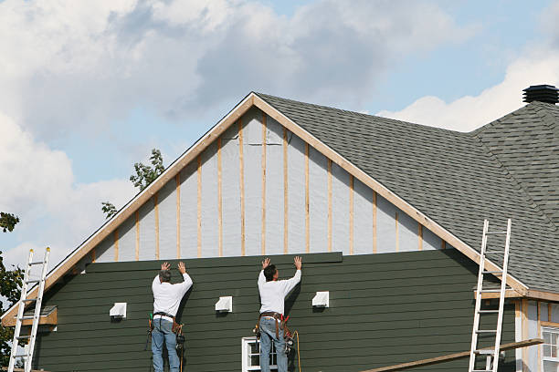 Professional Siding Installation technician working in Exton, PA